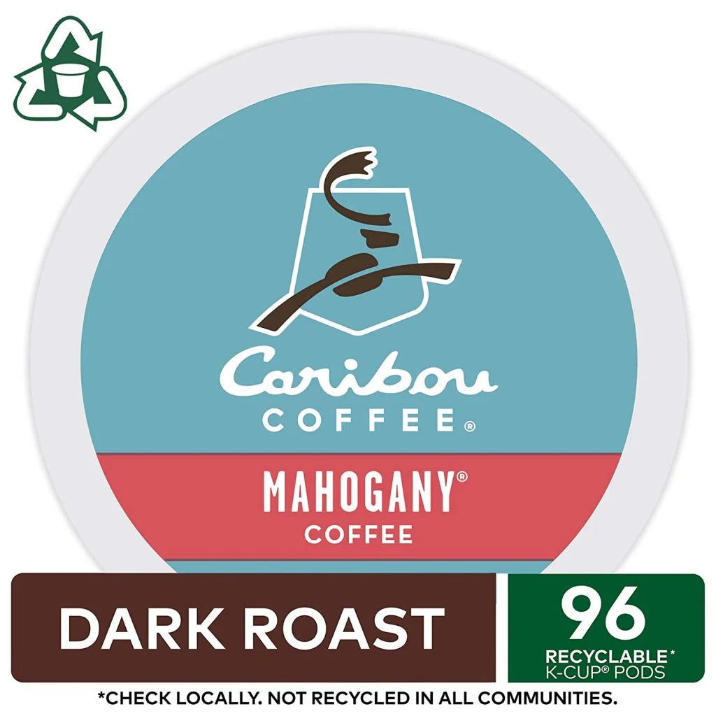 Caribou Coffee Mahogany Dark Roast K-Cup pod with blue and red label, 96 count.